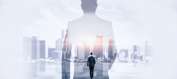 Back view of young businessman walking on abstract city background. Success and development concept. Double exposure